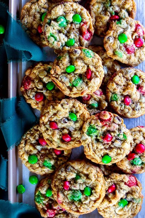 These soft and chewy Christmas Monster cookies are made with oats, pretzels, chocolate chips and fun holiday red and green M&M. The perfect cookie to gift or enjoy yourself! Christmas Monster Cookies, Festive Cookie Recipes, Pretzels Chocolate, Cranberry Orange Cookies, Monster Cookies Recipe, The Perfect Cookie, Toffee Bars, Festive Cookies, Christmas Cookies Easy