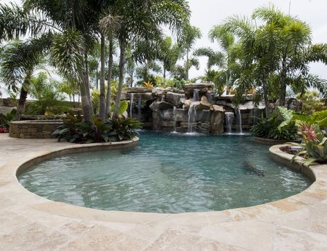 Pool With Sun Deck, Pool Elevated, Spool Pool, Waterfall Building, Underwater Lighting, Tropical Pool Landscaping, Elevated Planter, Sun Deck, Luxury Swimming Pools