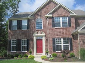 Brick house. Black shutters, red door Black Shutters Exterior, Shutters On Red Brick House, Shutter Colors For Brick House, Brick Dining Room, Brick Colonial House, Patio Door Coverings, Brick Living Room, Spring Door Decoration, Black Shutters