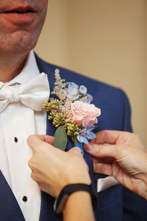 Blush spray rose and light blue delphinium boutonniere against navy suit. Hampton Morrow Photography Light Blue And Pink Boutonniere, Pink White Blue Boutonniere, Blue And Pink Boutonniere, Blue Delphinium Boutonniere, Delphinium Boutonniere, Navy Blue Wedding Bouquets, Rococo Wedding, Sunflower Weddings, Mauve Wedding Colors