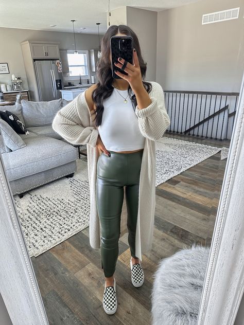 White Slip On Outfit, Green Leather Leggings Outfit, High Neck Top Outfit, Cardigan And Leggings Outfit, Olive Green Leggings Outfit, Outfit For Errands, Cropped Tank Top Outfit, White Leggings Outfit, Green Leggings Outfit