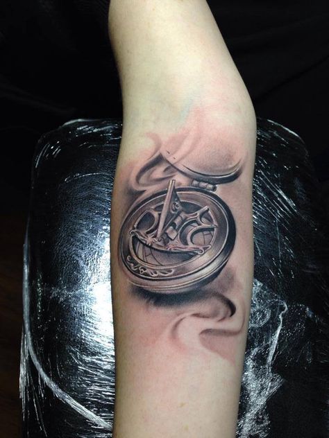 Tattoo. Pocket sun dial Sun Clock Tattoo, Sun Dial Tattoo, Sun Clock, Four Leaf Clover Tattoo, Clover Tattoo, Scar Cover Up, Sun Dial, Clover Tattoos, Upper Arm Tattoos