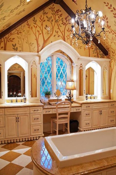 This is the Master Bedroom Bath of the custom Storybook Homes Design. It features a stand-alone tub with marble surround, twin vanities with gothic arch topped mirrors, and a makeup bar at the casement windows. Whimsical House, Witches House, Storybook House, Stand Alone Tub, Fairytale House, Storybook Homes, Fairytale Cottage, Storybook Cottage, Cottage Interior