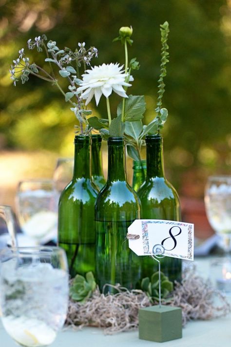 Green Wine Bottle Wedding Centerpieces, Green Bottle Wedding Decor, Green Bottles Decor, Green Bottle Centerpieces, Green Bottle Decor, Green Glass Centerpieces, Green Glass Wedding Decor, Green Wine Bottle, Bottle Green Wedding Theme