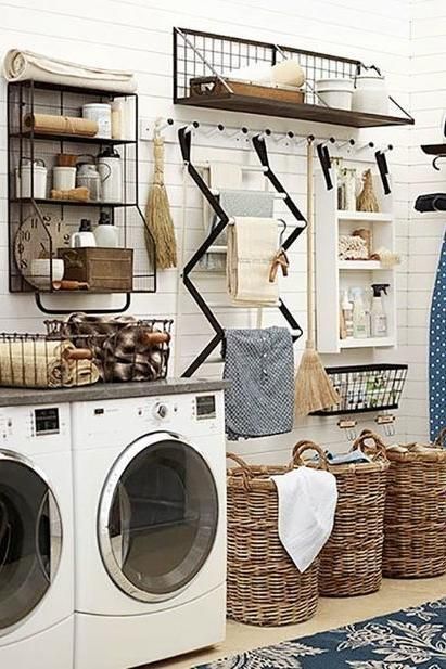 Organization Station - 10 Laundry Room Ideas We’re Obsessed With - Southernliving. Laundry rooms are hard-working spaces. Max out your storage and workspace with a meticulously thought-out organization station. This one has a place for everything.  See Pin Laundry Room Storage Shelves, Small Laundry Room Organization, Room Storage Diy, Diy Projektit, Laundry Room Inspiration, Casa Vintage, Small Laundry Room, Laundry Room Storage, Laundry Room Makeover