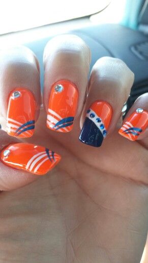 Denver Bronco nails! Utsa Roadrunners Nails, Broncos Nails Denver, Bronco Nails Design, Florida Gator Nails Designs, Edmonton Oilers Nails, Mets Nails, Navy And Orange Nails, Blue And Orange Nails Designs, Florida Gator Nails