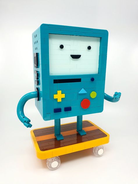 BMO busts a move - The Brothers Brick | The Brothers Brick Lego Adventure Time, Jake Adventure Time, Lego Diy, Adventure Time Cartoon, Amazing Lego Creations, Bust A Move, Lego Mocs, Lego Builder, Cool Lego Creations