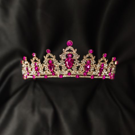 Ophelia's tiara is a beautiful landscape of hot pink color crystals set into gold color metal. Circle and tea drop shape pink colored crystals abound and top each point with splendor! Max Height at Center: 2.3 Inches  Total Length End to End: 13 Inches  Head Opening: 5 Inches Tiara is adjustable by carefully bending and stretching the ends apart to fit most hair styles and head sizes.  Tiara features loops on each end to secure to hair with bobby pins. Item ships from Michigan, USA. WARNING: CHO Hot Pink Quinceanera Theme, Hot Pink Quince, Pink And Gold Quinceanera Dress, Kathrine Howard, Hot Pink Crown, Doll Crown, Quinceanera Shoes, Pink Tiara, Quinceanera Dresses Gold