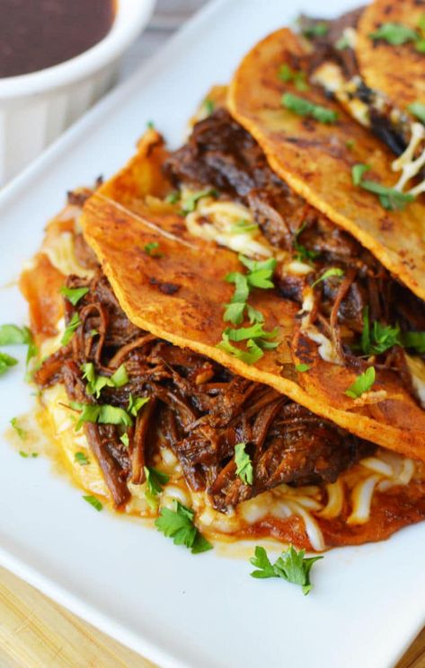 Instant Pot birria tacos are great. A spicy pulled beef recipe made in your pressure cooker or Ninja Foodi with a Mexican flare. Birria Tacos Instant Pot, Birria Quesadillas, Instant Pot Birria Tacos, Instant Pot Birria, Barrio Tacos, Birria Sauce, Beef Birria Tacos, Tacos Instant Pot, Instant Pot Beans Recipe