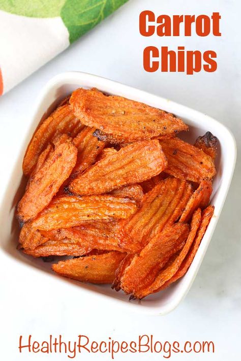 Tasty carrot chips are baked in a hot oven until crispy. Wonderful all by themselves, or dipped in a sour cream dip. Baked Carrot Chips, Carrot Chips, Healthy Chips, Sour Cream Dip, Cream Dip, Homemade Chips, Veggie Chips, Carrot Recipes, Healthy Food Blogs