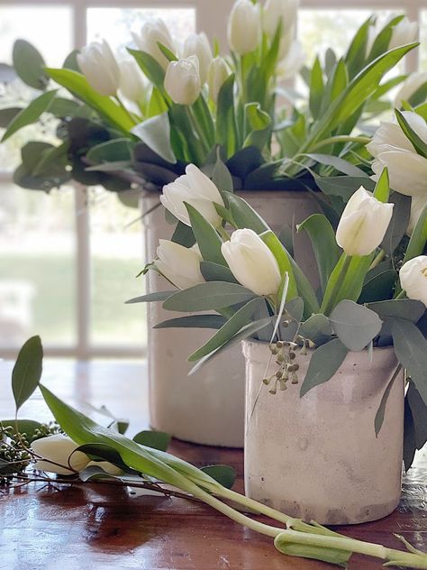 I loved creating these spring floral arrangements using my vintage crocks and these gorgeous tulips from Trader Joes. These arrangements are inexpensive, easy to make and look way nicer than they cost. Vintage Crocks, 100 Year Old Home, Garden Boxes Diy, Vintage Crock, Tulips Arrangement, Spring Flower Arrangements, Spring Arrangements, Spring Floral Arrangements, Diy Arrangements