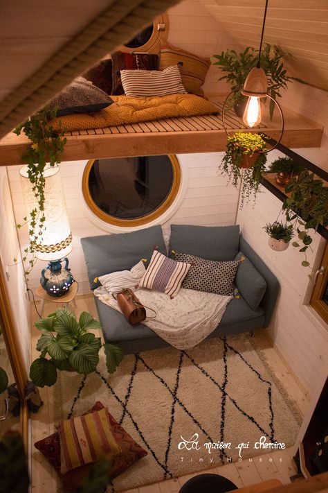 Cottage feel tiny house boasts a creative staircase that leads up to two lofts - Living in a shoebox Design Case Mici, Above The Couch, Round Windows, Tiny House Interior, Tiny House Living, Tiny House Design, Tiny Living, Dream Rooms, A Living Room