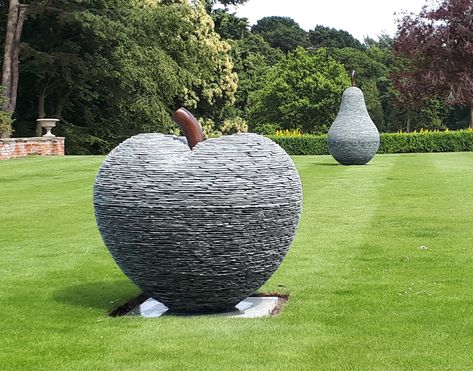 Apple and Pear slate sculpture with bronze stems, by James Parker. #gardensculpture #gardendesign #gardenart #slatesculpture #jamesparkersculpture #drystone #sculpture #art #attentiontodetail #wowfactor #luxurylifestyle #highendart Cawdor Castle, James Parker, Slate Garden, Metal Sculptures Garden, Sea Cliff, Gallery Lighting, Metal Sculptures, Dry Stone, Tree Carving