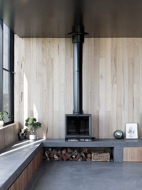 Three Black Timber Pavilions Connected by a Masonry Wall: Fish-Creek House Fireplace Concrete, Wood Burning Stoves Living Room, Concrete And Wood, Creek House, Wood Stove Fireplace, Wood Heater, Freestanding Fireplace, Masonry Wall, Long Walls