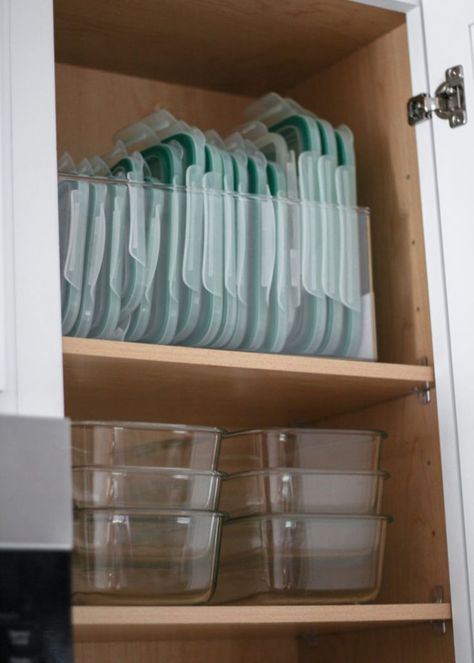 Apr 23, 2020 - A Mix of Min shares tips on organizing your kitchen with products from The Container Store. Tupperware Organizing, Organiser Cucina, House Organisation, Desain Pantry, Kitchen Organization Pantry, Kitchen Organization Diy, Kitchen Organisation, Organisation Hacks, Apartment Organization