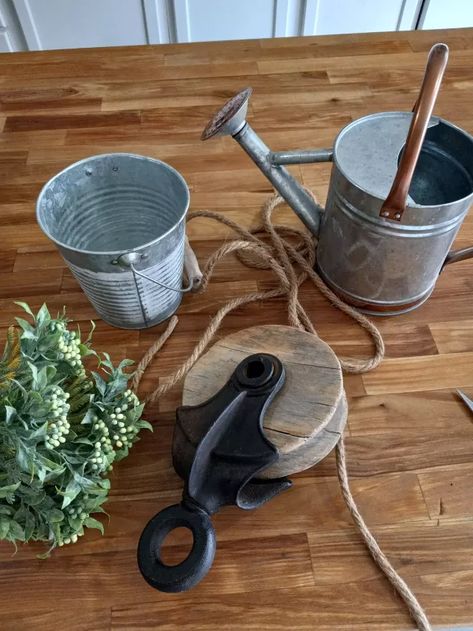 How I Made a Farmhouse Pulley and Bucket Planter | Hometalk Dollar Tree Plant Hanger, Galvanized Bucket Planters, Step Decor, Bucket Decor, Backyard Escape, Cute Farmhouse, Bucket Planters, Pallet Storage, Galvanized Buckets