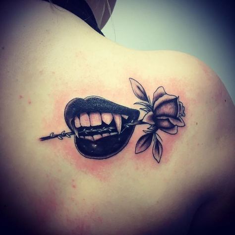 Vampire mouth & rose tattoo done today by Andy Clark @ baby boy tattoo studio. Vampire Lips Tattoo Design, Female Vampire Tattoo Ideas, Spooky Hip Tattoo, Rose In Mouth Tattoo, Vampire Tattoo For Women, Vampire Mouth Tattoo, Vampire Lips Tattoo, Vamp Tattoo, Vampire Bite Tattoo