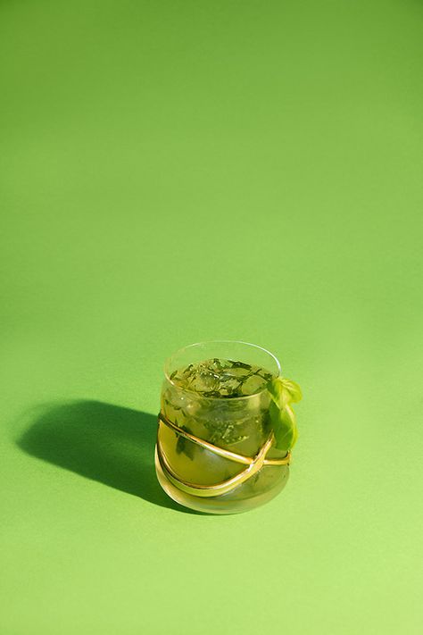 Basil Gimlet | 17 Futuristic Twists On Vintage Cocktails Basil Gimlet, Beverage Photography Ideas, Basil Cocktail, Gimlet Cocktail, Vintage Cocktails, Glass Garnish, Beverage Photography, Natural Mineral Water, Basil Leaf