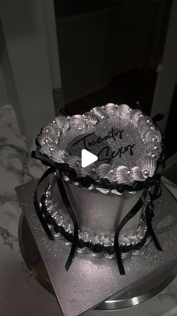 Pamela Anaele on Instagram: "Twenty Sexy! Silver and black coquette heart cake😍. Topper by @ziandi_boutique #baltimorebaker #baltimorecakes #heartcake #vintagecake #glittercake #dmvbaker #dmvcakes #cakereels #caketrends #cakesofinstagram #cutecake #birthdaycake #trendingreels #blowthisup #customcake #coquette #coquettecake #bowcake" Birthday Cake Black And Silver, Silver Heart Cake, 20th Birthday Cake Aesthetic, Birthday Cake Aesthetic Vintage, Black And Silver Cake, Artichoke Frittata, Birthday Cake For Women Elegant, Birthday Cake Aesthetic, Birthday Cake Alternatives