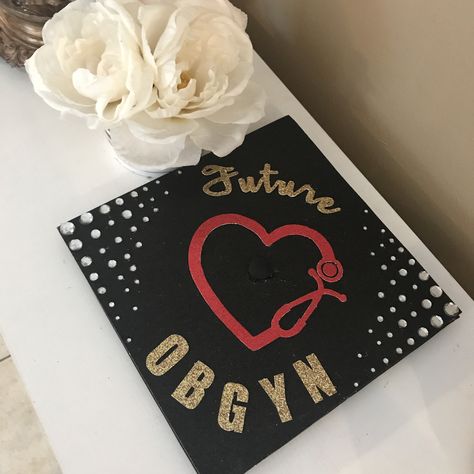 Custom graduation cap Future OBGYN (made by Alyssandra) #graduationcap  #alymade Obgyn Graduation Cap, Obgyn Aesthetic, High School Graduation Cap Designs, Graduation Cap Decoration Nursing, Education Graduation Cap, Closet Idea, Nurse Graduation Cap, Nursing Motivation, Custom Graduation Caps