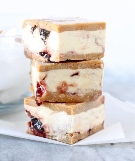 Peanut Butter and Jelly Ice Cream Sandwiches | We’ll never tire of the classic sweet and salty combo—so why restrict it to brown bag lunches? These PB&J recipes span every meal of the day, from smoothies and granola to decadent ice cream sammies. Peanut Butter Jelly Ice Cream, Peanut Butter Jelly Recipes, Jelly Ice Cream, Homemade Ice Cream Sandwiches, Fatty Foods, Slow Cooker Desserts, Keto Ice Cream, Desserts Vegan, Ice Cream Sandwiches