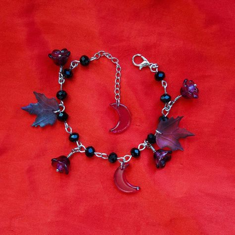 Gothic October day 10: features a purple moody bracelet with black faceted beads, purple sparkly moons, purple/green gradient leaves, and glass purple bell flowers. As a fun scavenger hunt, I left some free goodies at empressos coffee house. Swipe to view what you can get 🫶🏼🍓 #jewelry #earrings #stickers #coffee #etsy #smallbusiness #smallbusinessowner Purple Green Gradient, Purple Bell Flowers, Dog Paw Bracelet, Witch Horror, Bell Flowers, Paw Print Bracelet, Animal Bracelet, Teen Jewelry, Medic Alert Bracelets