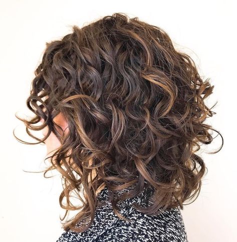 60 Styles and Cuts for Naturally Curly Hair Curly Inverted Long Bob, Mid Length Curly Hair With Layers Bangs, Layers For Long Curly Hair Natural Curls, Medium Length Haircut With Curls, Uneven Curly Hair, Layered Curly Haircuts Natural Curls With Bangs, Layered Curly Haircuts Natural Curls Medium, Curly Lob Haircut Shoulder Length, Should Length Hair With Layers