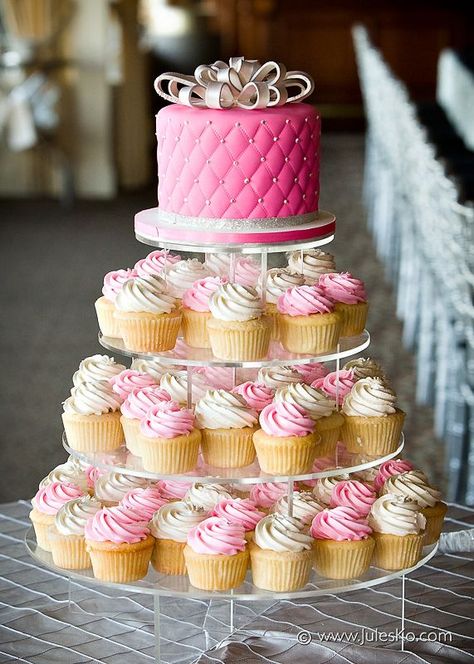 Pink and White Cupcakes Setup Like Wedding Cake Cupcake Tower Birthday Sweet 16, Pink Cupcake Tower, Sweet 16 Cake And Cupcakes, Quinceanera Cupcakes Ideas, Pink And White Cupcakes Ideas, 16 Cupcake Cake, Pink And White Cupcakes, Sweet 16 Party Planning, Sweet 16 Cupcakes