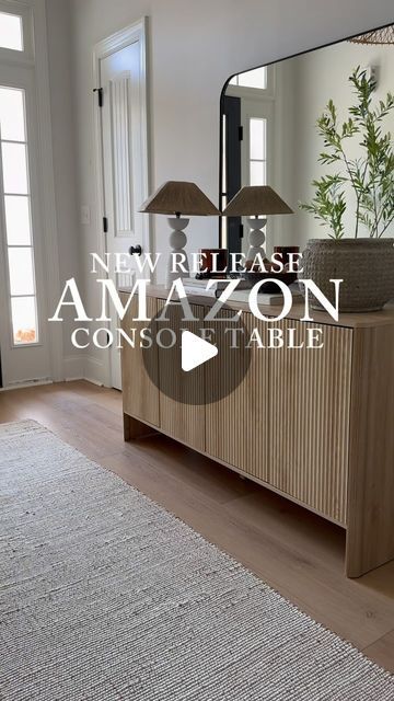 Jeanne Zamith | Organic & Neutral Home Decor on Instagram: "‼️JUST RELEASED‼️

This new ✨beauty✨ of a fluted console table is from Amazon & is under $300!! The wood tone is so so pretty. Would be great as a buffet, tv stand, or coffee bar too!! 

Push to open & there’s shelving for storage 😍

Comment “CONSOLE” & I’ll send a link to this console table & everything I used to style it!! 🤎" Under Tv Table, Console Under Tv, Tv Console Styling, Table Under Tv, Fluted Console Table, Under Tv Decor, Fluted Console, Buffet Tv Stand, Shelving For Storage