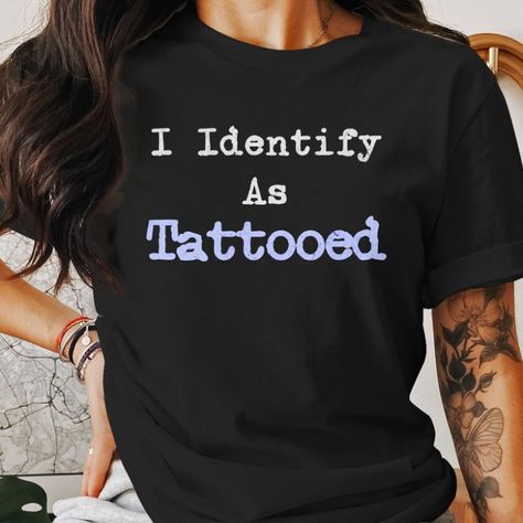 shirt with tattoo design, identity tattoo tee, inked pride t-shirt, expressive tattoo apparel, personalized ink statement, unique body art shirt, custom tattooed identity, edgy tattoo lover top, bold inked fashion, alternative tattoo wear, individual tattoo tee, artistic body modification, creative tattoo expression, personalized ink tee, statement tattoo clothing, distinctive inked shirt, customized tattoo apparel, expressive body modification, standout tattoo fashion Identity Tattoo, Statement Tattoo, Individual Tattoo, Tattoo Apparel, Edgy Tattoo, Tattoo Fashion, Tattoo Shirt, Fashion Alternative, Creative Tattoo