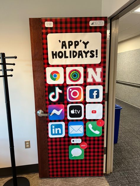 A door decorated with app photos like an iPhone and says appy holiday with a gingham wrapping background. Taylor Swift Christmas Door Decoration, Holiday Movie Door Decorating Contest, Funny Christmas Door Decorations Contest, Funny Christmas Door, Holiday Classroom Doors, Christmas Doors, Christmas Door Decorating Contest, Taylor Swift Christmas, Classroom Doors