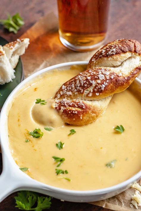 A soft pretzel dipped into a white bowl full of beer cheese dip Soft Pretzels And Beer Cheese, Pretzels And Beer Cheese, Fall Dessert Bar, Beer Cheese Recipe, Beer Cheese Sauce, Beer Sauce, Soft Pretzel Bites, Pretzel Cheese, Beer Cheese Dip