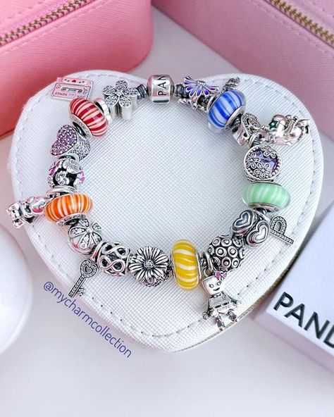 Patricia - Charms & Brazaletes on Instagram: "Pandora bracelet mixing old and new 😊🌈 I love the candy muranos in this rainbow bracelet #pandora #mypandora #pandoracharms #mypandorabracelet #mycharmcollection #pandoracandystripesmurano" Cute Multicolor Charms Bracelet, Cute Multicolor Charm Bracelets, Multicolor Hand-strung Charm Bracelet As Gift, Pandora Bracelet Multicolor, Multicolor Hand-strung Charm Bracelet, Pandora Bracelet Charms, Rainbow Bracelet, Candy Stripes, New Me