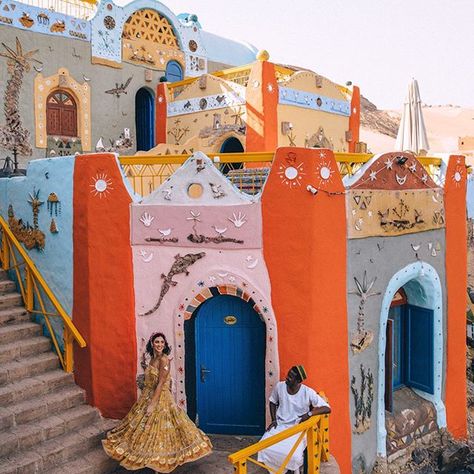 Nubian Village in Aswan, Egypt #pyramids #visitegypt #ancientegypt #instagram #egypt #egypttravel | Things to do in Egypt | things to do in Aswan Egypt| Egypt photography | Aswan Egypt things to do | Egypt travel tips | Egypt Instagram photo spots | Egypt pyramids | Cairo Egypt | Aswan Egypt photography | Abu Simbel Egypt | Aswan | Egypt travel clothes | Egypt travel clothes women | what to wear in Egypt Nubian Village, Egypt Outfits, Egypt Itinerary, Places In Egypt, Pyramids Egypt, Great Pyramid Of Giza, Visit Egypt, Painted Walls, Pyramids Of Giza