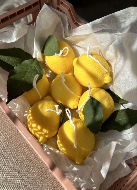 * For any purchase request in large quantities for an event, do not hesitate to contact me. Brighten up your space with our lemon-shaped candle, an artistic creation that evokes summer and the freshness of citrus fruits. Every detail of this candle is carefully shaped to capture the realistic appearance of a juicy, sunny lemon. Lemon is a symbol of vitality and refreshment, and our candle captures all of its vivacity. Its bright shape and color immediately evoke a palette of flavors and a sunny Fruit Candle, Fake Lemons, Fruit Candles, Lemon Candle, Candle Dish, Fruit Fruit, Idea Wedding, Fake Fruit, Artificial Fruit