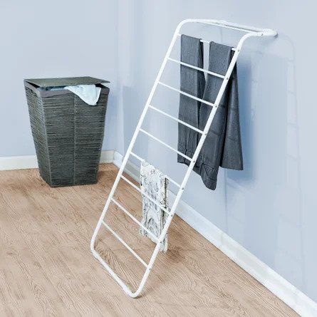 These Clothing Racks Make Air-Drying Laundry So Easy Wall Drying Rack, Easy Bathroom Updates, Wall Mounted Drying Rack, Drying Rack Laundry, Shower Organization, Laundry Drying, Clothes Drying, Laundry Room Storage, Clothes Drying Racks