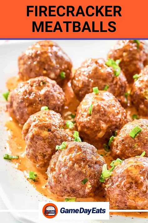 Looking for a tasty appetizer or game day snack? These Firecracker Meatballs are a touchdown! Juicy and flavorful homemade ground beef meatballs are baked in the oven and then covered in a creamy sauce with a kick of heat. Impossible to resist, they're sure to be a crowd-pleaser at your next gathering. Get the easy recipe and find out how to make the best firecracker meatballs. Firecracker Meatballs, Homemade Ground Beef, Vegetable Fried Rice Recipe, Ground Beef Meatballs, Savory Meatballs, Tgi Fridays, Meatball Recipes Easy, Honey And Soy Sauce, Appetizers For A Crowd