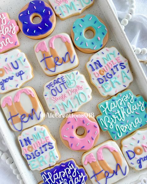 Donut grow up cookies 🍩 // In my double digit era // Donut birthday cookies 🍪 Pricing? 👉🏻 https://msha.ke/alecreations918 • • • • #alecreations918 #tulsasmallbuisness #tulsaoklahoma #decoratedsugarcookies #customcookies #cookie #cookies #decoratedcookies #inspirationcookies #cookiesofinstagram #desserts #dessertideas #dessertideas #partyideas #party #sugarcookies #royalicing #royalicingcookies #cookies #cookiesideas #royalicingideas #donutcookies #donutgrowupcookies #donutcookie #birthdaycoo... Cookies For Birthday Party, Cookies For Birthday, Up Cookies, Donut Birthday, Tulsa Oklahoma, Birthday Cookies, Royal Icing Cookies, Custom Cookies, Sugar Cookies Decorated