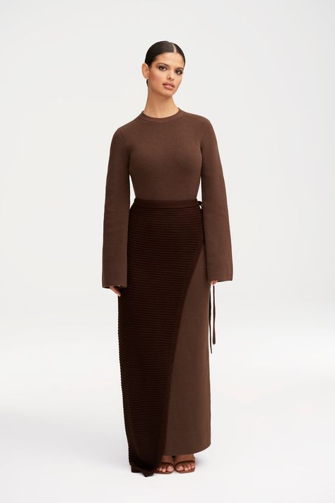 Elevate your wardrobe with our Grace Knit Maxi Dress & Wrap Skirt Set. The subtle flare sleeves add a touch of sophistication, while the color contrasting knit creates a unique and elegant look. With the versatility of a dress and wrap skirt, this set is a must-have for any wardrobe. Model is 5'6 and is wearing size S/56". Fall Wrap Dress Outfit, Knitted Maxi Skirt Outfit, Dresses Fall 2024, Wrapped Skirt Outfit, Holiday Outfits For Curvy Women, Maxi Knit Skirt, Red Skirt Outfit Winter, Cool Undertones Clothes, Knit Maxi Skirt Outfit