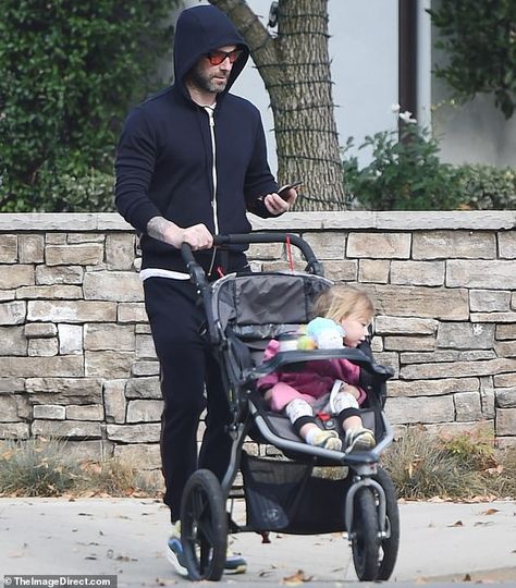 Adam Levine enjoys wintry stroll with daughter Dusty Rose, two, as they prep for a family Christmas Adam Levine Style, Day Before Christmas, Adam Levine, Maroon 5, Celebrity Photos, Christmas Eve, Dusty Rose, Family Christmas, Before Christmas