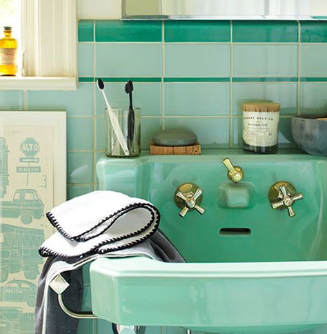 Mint green bathrooms make for a great start and end to the  day. Baie Vintage, Mint Green Bathrooms, Mint Bathroom, Bathroom Retro, Colorful Bathroom Tile, Vintage Sink, Green Sink, Retro Bathrooms, Vintage Bathrooms