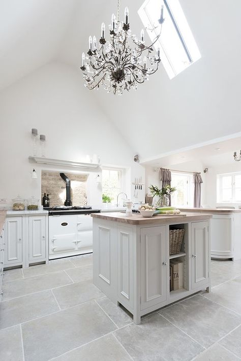 No longer just a cooking amenity, modern kitchens also double as a social space for entertaining! Give your kitchen the dose of glamour it deserves with elegant grey cabinetry and a chandelier. http://www.solidwoodkitchencabinets.co.uk Kitchen Floor Tile Patterns, Modern Kitchen Tile Floor, Grey Tile Kitchen Floor, Modern Kitchen Flooring, Neptune Kitchen, Kitchen With White Cabinets, Trendy Kitchen Tile, Kitchen Floor Tiles Ideas, Grey Floor Tiles