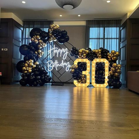 Black/Gold Balloon garland with a 30 Marquee sign Black And Gold 50th Birthday Backdrop, 30th Birthday Balloons Decoration Men, Decoration For Men's Birthday, 75th Birthday Centerpieces Ideas For Men, 30th Birthday Parties Men, 35th Birthday Backdrop Ideas, 30th Birthday Backdrop For Men, All Black 30th Birthday Party For Men, Men Black And Gold Party Ideas