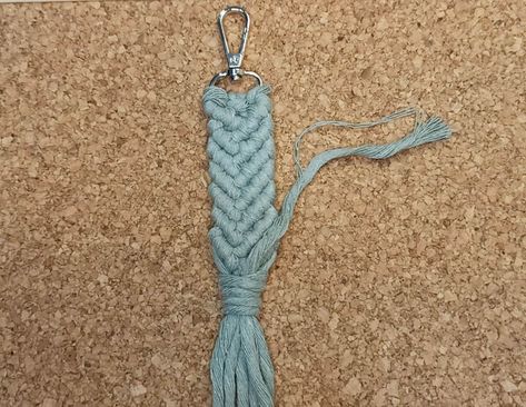 Hello DIYers!This macrame project is about macrame mermaid tail keychain. Mermaid keychain is also called fish keyring, mermaid key holder or key fob.There are almost everything what you need to make keychain in this post. Step by step video tutorial, free patterns images, which types of knot you will use, what size macrame cord for keychains, macramé keychain kit, some keychain prices on Etsy or Amazon.Let’s get started!Supplies for Macrame Tail KeyringYou can choose my macrame keycha… Macrame Mermaid Tail, Mermaid Tail Keychain, Mermaid Keychain, Tail Keychain, Types Of Knots, Half Hitch Knot, Macrame Knots Tutorial, Mermaid Diy, Knots Tutorial