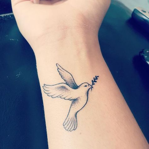 Friendship Dove Tattoo, Dove Holding Olive Branch Tattoo, Christian Dove Tattoo, World Peace Tattoo, Dove Olive Branch Tattoo, Dove And Olive Branch Tattoo, Traditional Dove Tattoo, Dove With Olive Branch Tattoo, Peace Dove Tattoos