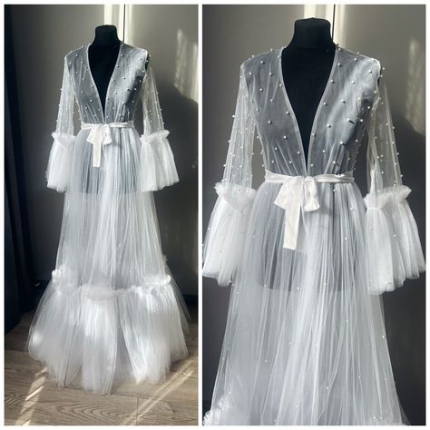 This is the gorgeous, beautiful robe Very pleasant to the body. Delicate dress for the perfect morning of the bride. We also have nightgowns and pajamas that you can wear under a robe https://www.etsy.com/shop/SavchenkoDesign?ref=seller-platform-mcnav§ion_id=41256169 If you can't find the information you need or need some advice for your design? Feel free to contact us. We are fast to reply :) Pregnancy Gown, Delicate Dress, Maternity Photoshoot Outfits, Wedding Robes, Perfect Morning, Bridal Robe, Wedding Robe, Pearl Dress, Maternity Gowns