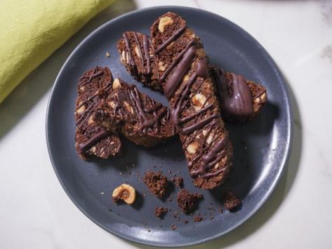 Double Chocolate Hazelnut Biscotti Double Chocolate Hazelnut Biscotti, Tournament Snacks, The Kitchen Food Network Recipes, Greek Honey Cake, Double Chocolate Biscotti Recipe, Hazelnut Biscotti Recipe, Chocolate Hazelnut Biscotti, Hazelnut Biscotti, Chocolate Rain