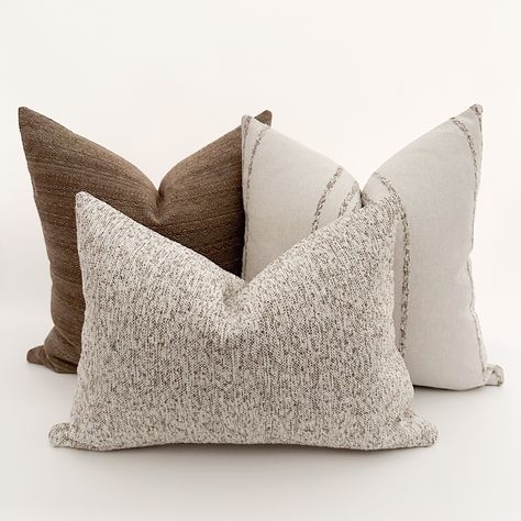 For those of us who like a calm atmosphere neutral decor makes for a restful mood. Meet our Naturally Neutral Pillow Cover Set. Its natural earth tones paired with luxurious texture for ultimate comfort  for any space in your home.  Visit @HacknerHome and see the design possibilities of Jona's upscale decorative pillow covers styled by interior designers and skilled home styles. I T E M S Set of three pillow covers: (1) 22"x22" Cocoa | Same Back (1) 20"x20" Hay Sack Linen | Same Back (1) 14"x20" Couch Grau, Beige Couch, Neutral Pillow Covers, Neutral Pillow, Neutral Throw Pillows, Pillow Combos, Throw Pillows Living Room, Neutral Pillows, Pillow Arrangement