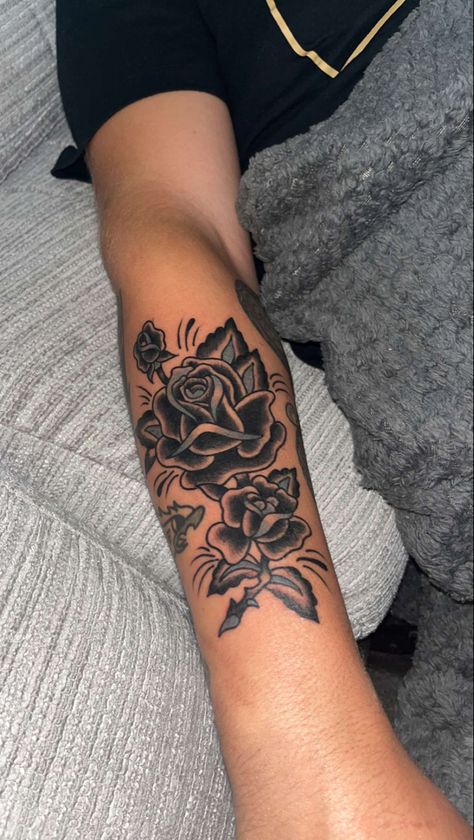 Roman Numeral Rose Tattoo, Men’s Forearm Tattoos Flower, Manly Flower Tattoos, Rose Patchwork Tattoo, Small Rose Tattoo Men, Rose Tattoo Men Arm, Tattoo Outer Forearm, Traditional Forearm Tattoo, Rose Traditional Tattoo