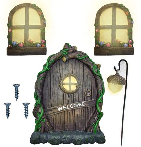 PRICES MAY VARY. 1 set Fairy garden door and windows. Package including 1*Fairy Door, 2 Fairy Windows and 1*Fairy Lantern The fairy windows, the door window and the Fairy Lantern are coated with phosphorescence, which absorbs sunlight during the day and glows faintly light automatically at night. Perfect Gift for Child. Invite fairies into your home，you and your child will be able to enjoy a magical interactive journey This fairy door set have a hook on the back for easy hanging. You can put the Fairy Windows, Fairy Doors On Trees, Giant Christmas Ornaments, Garden Decor Crafts, Fairy Garden Doors, Fairy Garden Kit, Fairy Lanterns, Garden Door, Mini Fairy Garden